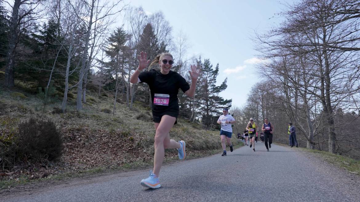 10k-runner-waving-scaled.jpg